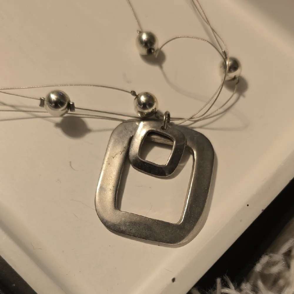 Elegant Silver Beaded Necklace with Geometric Square Silver Pendant